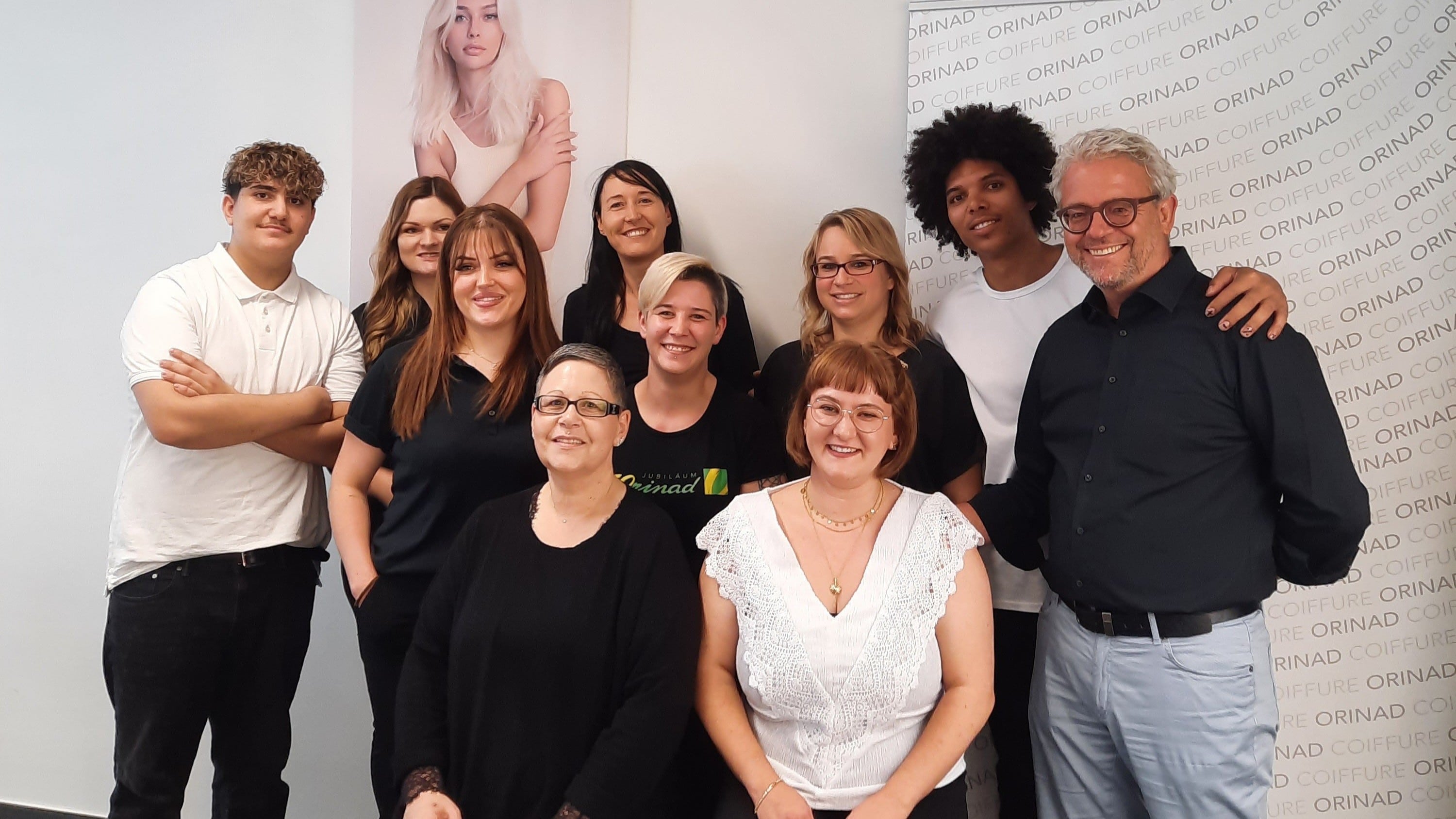 Gruppe von Personen. Zeigt das Orinad Team Chur